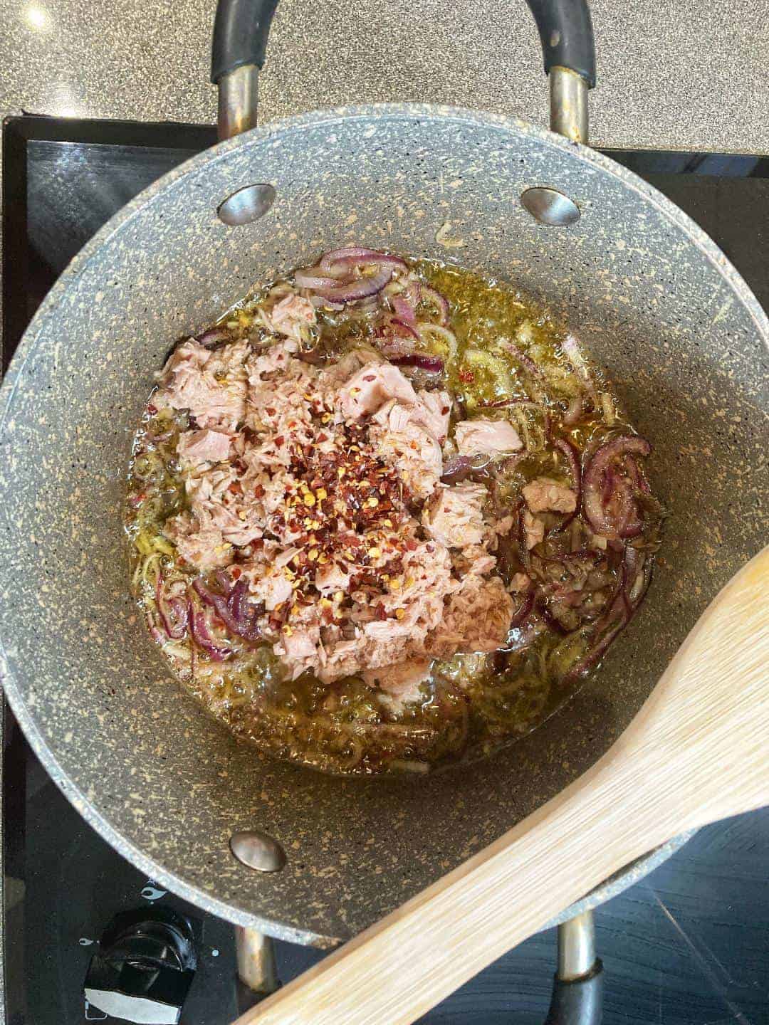 add tuna and chili flakes