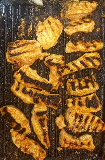 grilling the chicken tikka