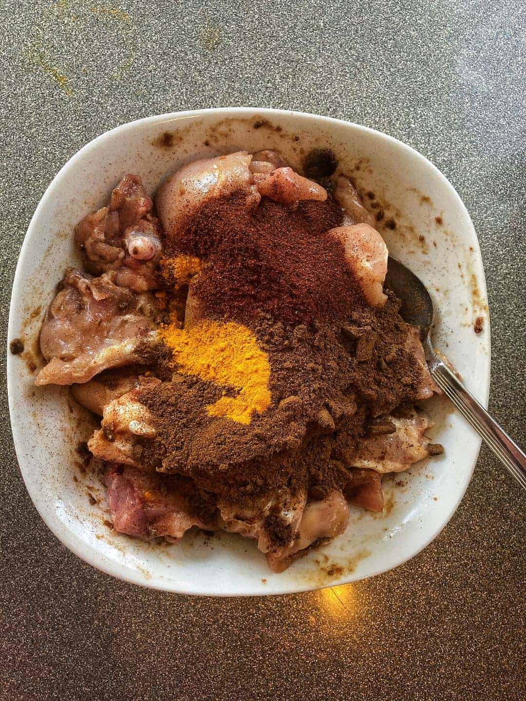 Masala Adding add Indian spices homemade masala to chicken | Spice and Life