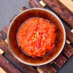 Homemade Chile Puya Salsa in a ceramic bowl.