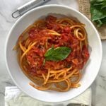bucatini pomodoro with basil.
