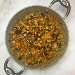 Sicilian caponata in a stone saucepan.